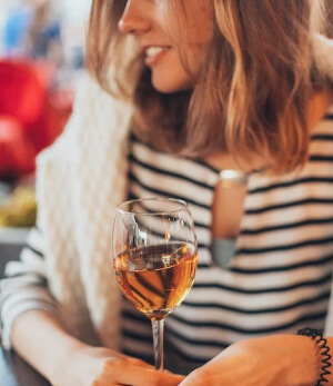 girl tasting wine